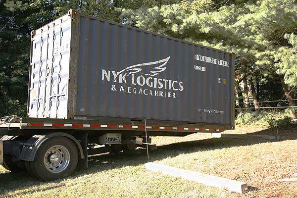 backing container into position.