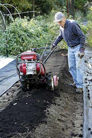 Rototill compost into bed 